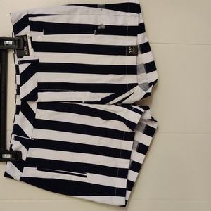 Navy and white striped shorts.